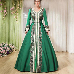 Click to view Пышное(не пышное), зелёное, закрытое(с длинным рукавом) свадебное платье в национальном стиле. Подойдёт для кыз узатуу, кына геджеси(kına gecesi), келин сарпо. Платье оформлено кружевом с золотыми пайетками и плетённой тесьмой, имеется отделка горным хрусталём. Плетёный пояс. Платье полностью на подкладе.